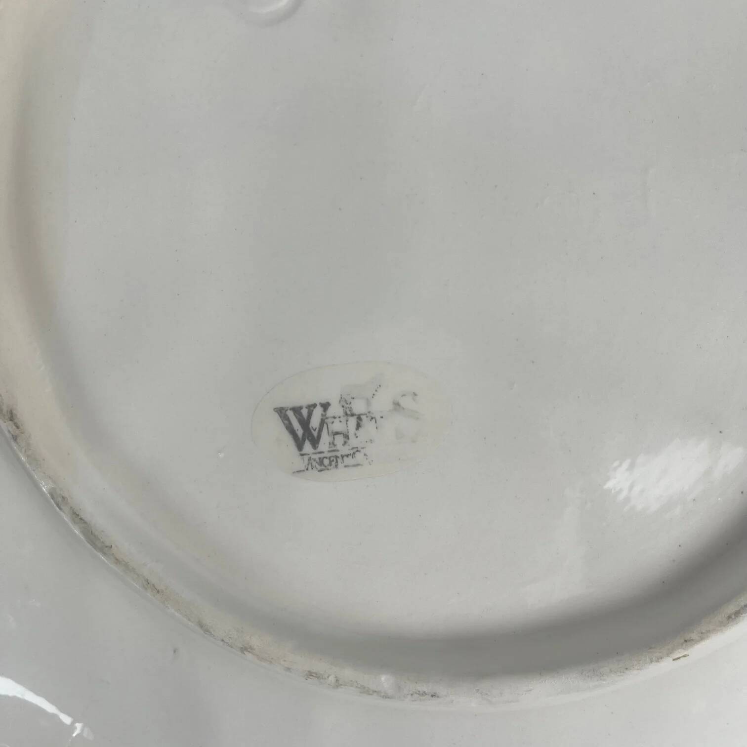 Leaf and strawberry-shaped bowl/strainer.