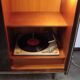 A vintage cabinet with a record player and a bar, 1960s.