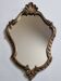 Antique rococo mirror in patinated gilded wood with shell decoration 49 x 31 cm