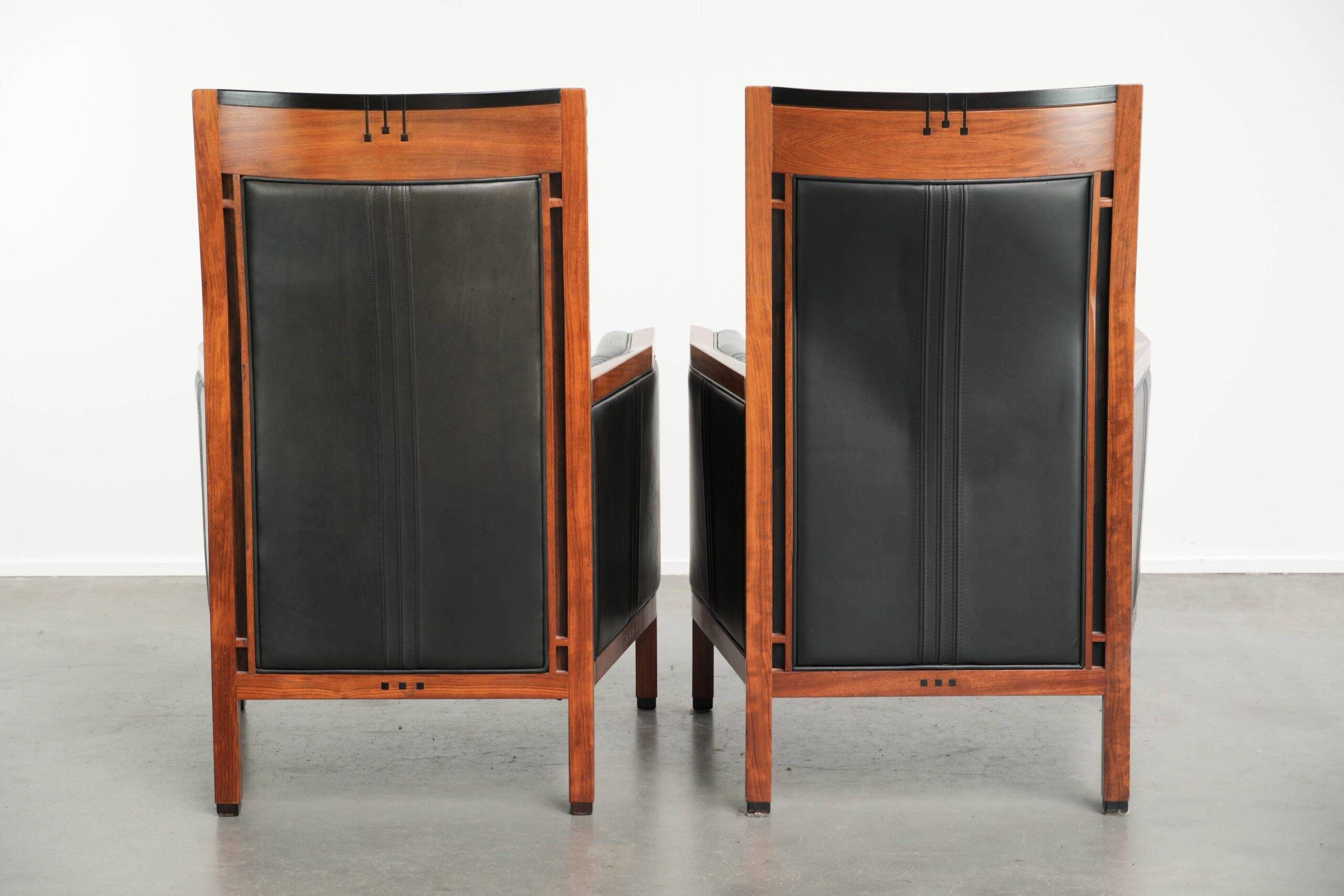 Set of 2 Art Deco design armchairs in black cowhide leather