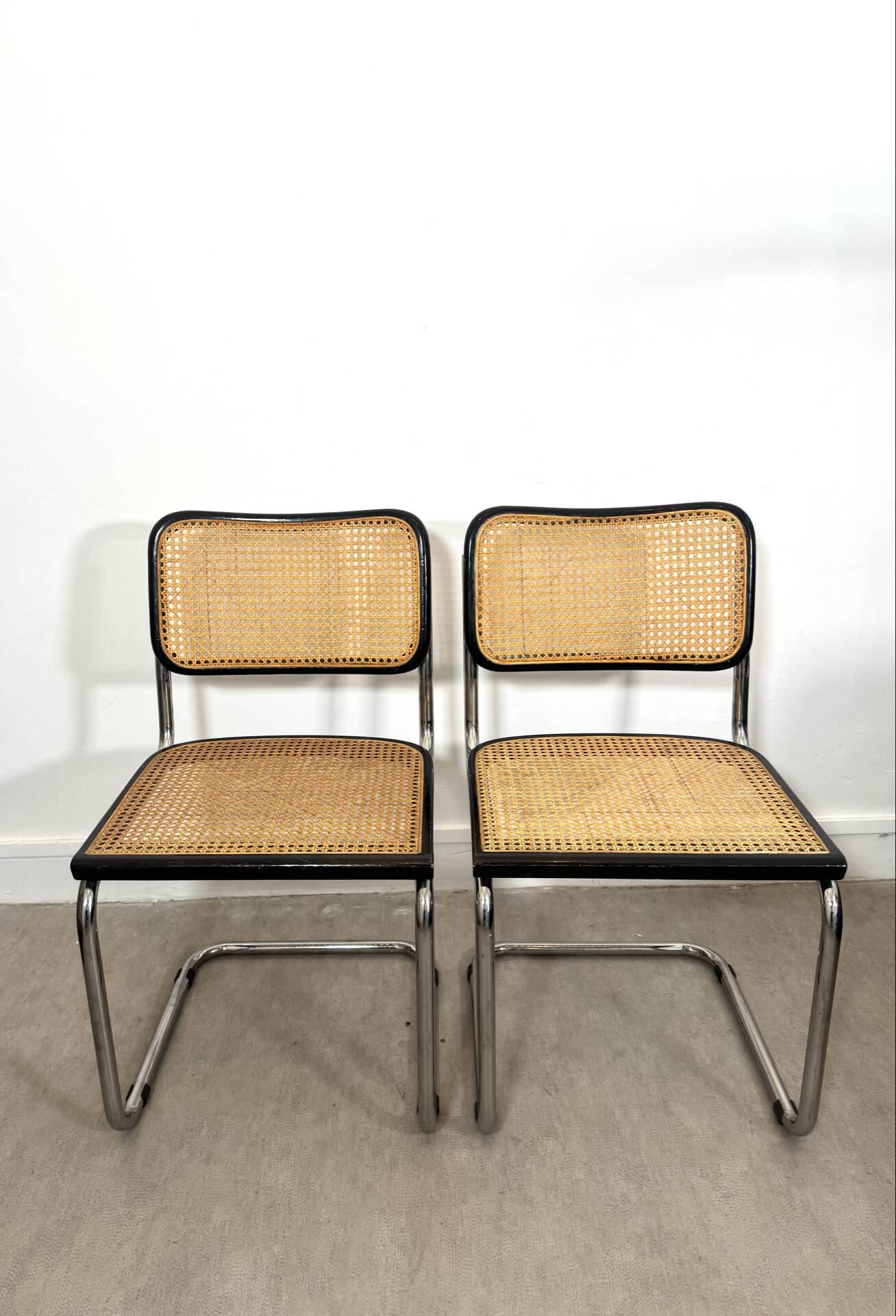 Pair of Marcel Breuer B32 Cesca chairs made in Italy.