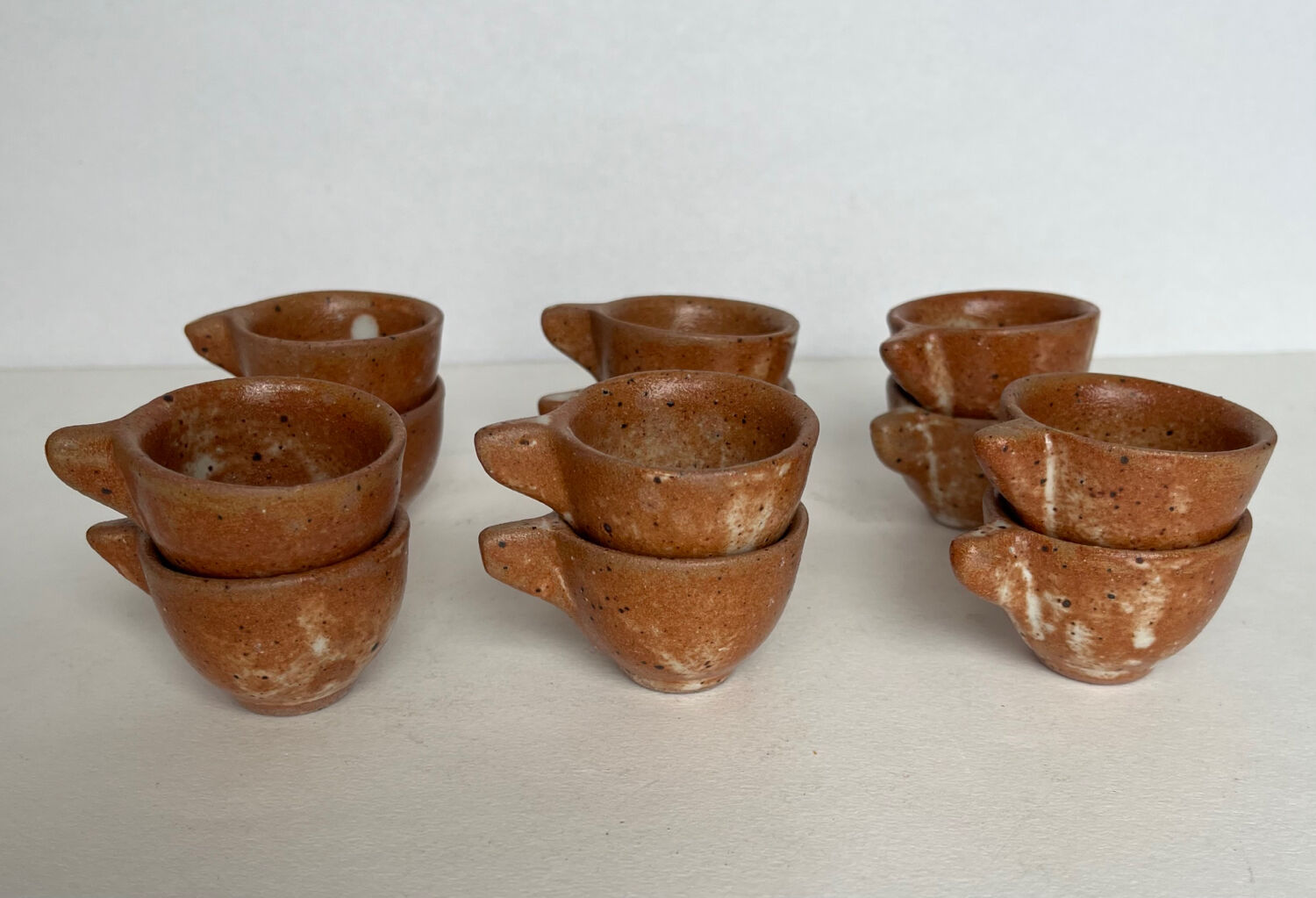 11 stoneware shot cups