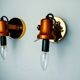 Pair of articulated "Cocoon" wall lights in resin and pine, Italy, 1970
