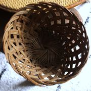 Vintage high round wicker basket with openwork.