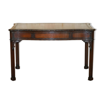 WARING & GILLOW library desk in the style of Thomas Chippendale with a leather top.