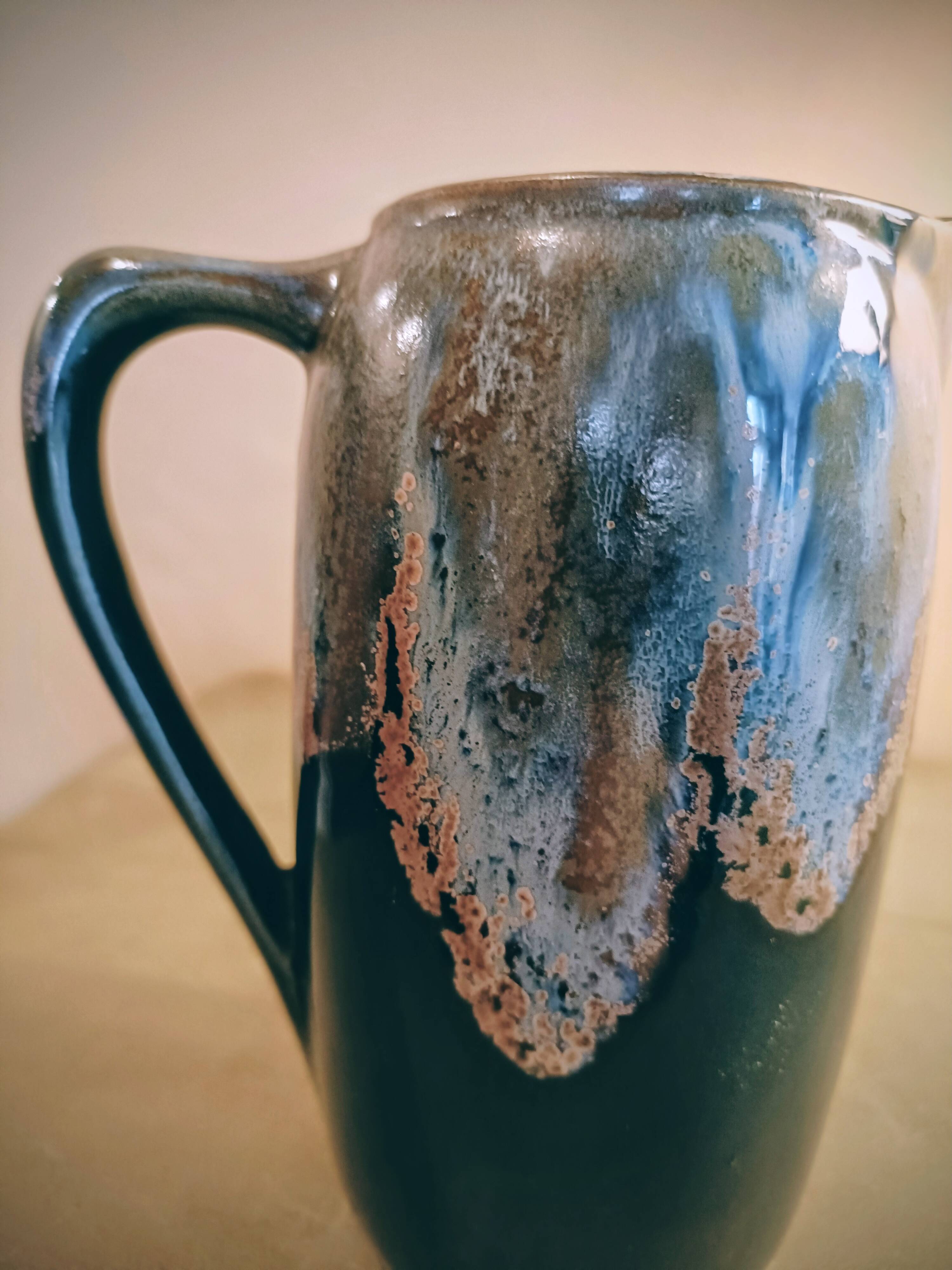 Flamed stoneware pitcher signed Denbac