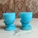 Pair of blue opaline egg cups signed SV Schmid Glassworks