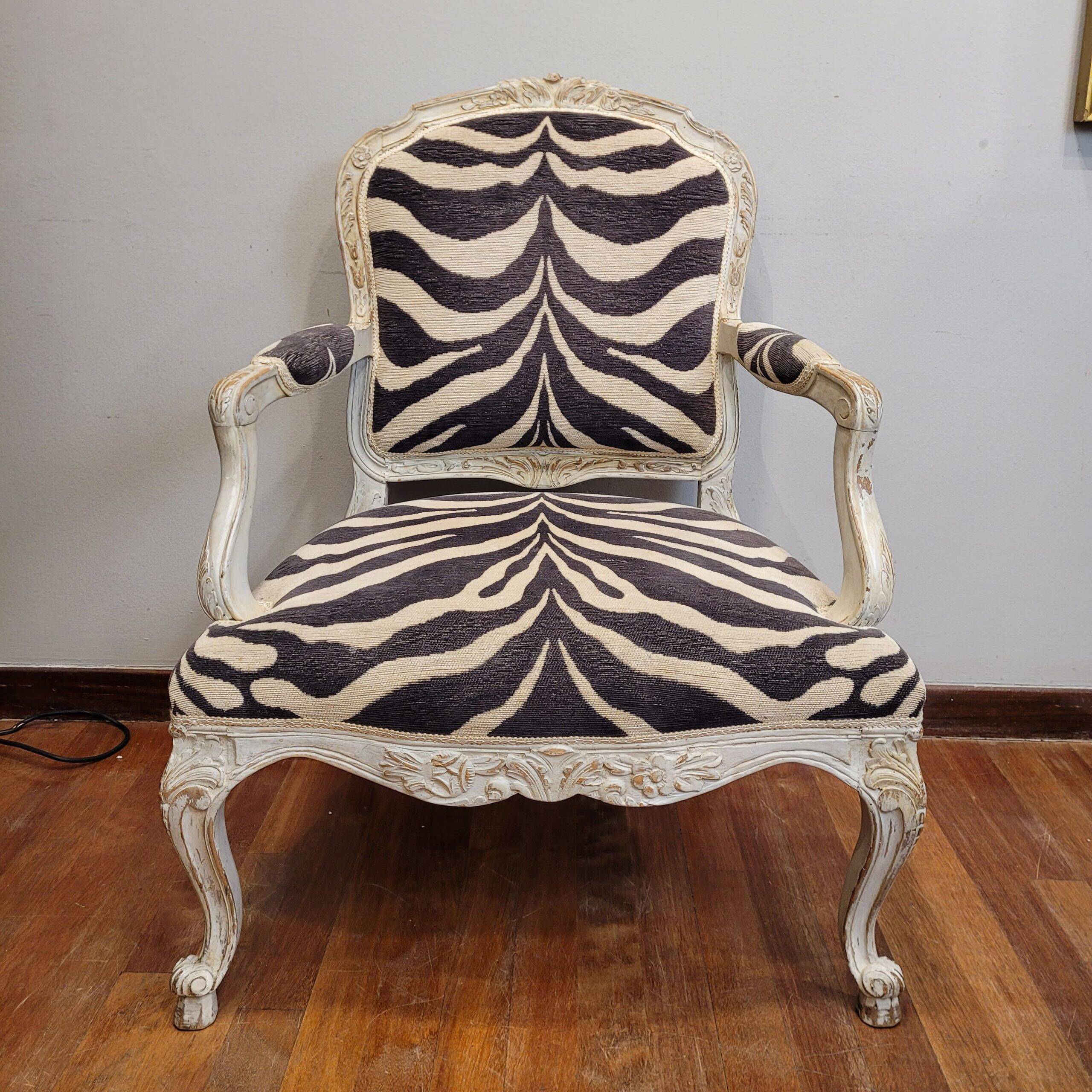 Pair of armchairs, carved and polychrome wood, printed zebra tapestry, Louis XV, circa 1790 – France