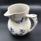 Vintage pitcher iron earth
