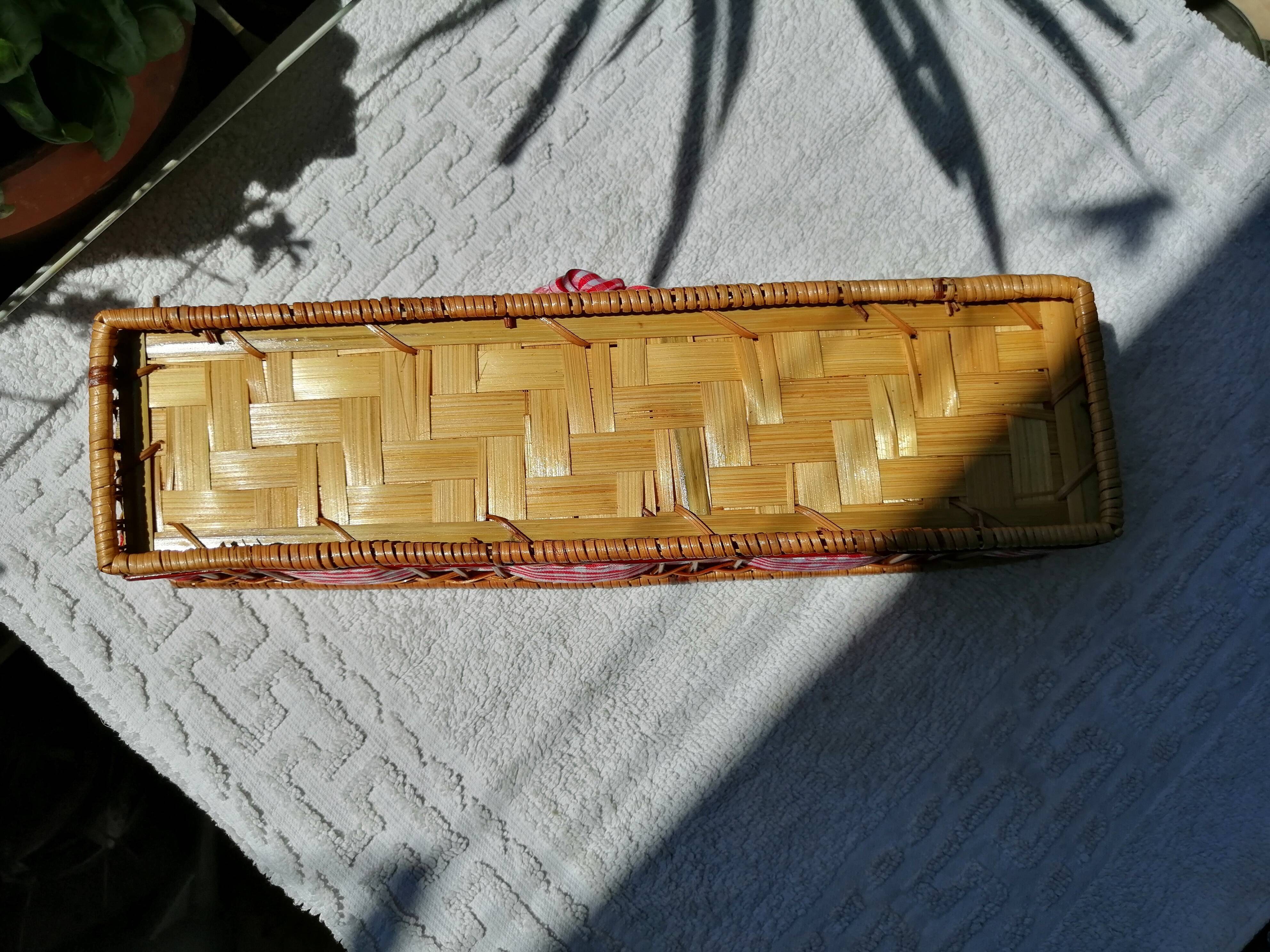 Basket in rattan or Wicker and vintage red gingham fabrics