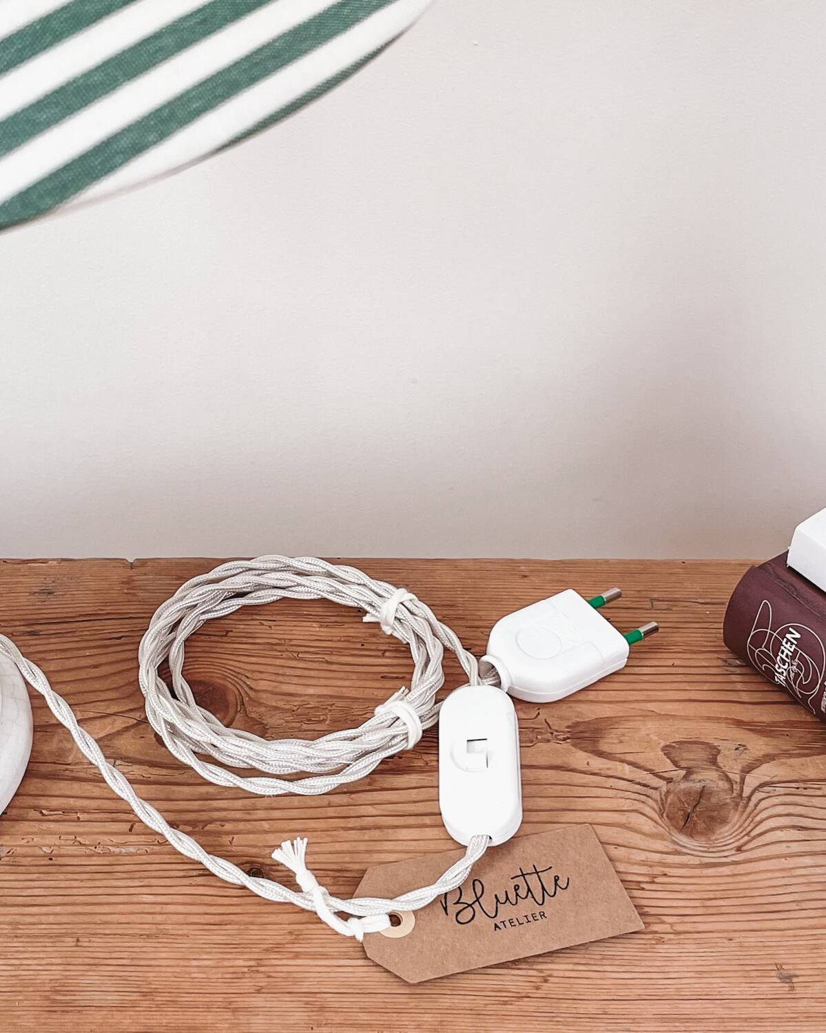 Earthenware lamp and striped lampshade