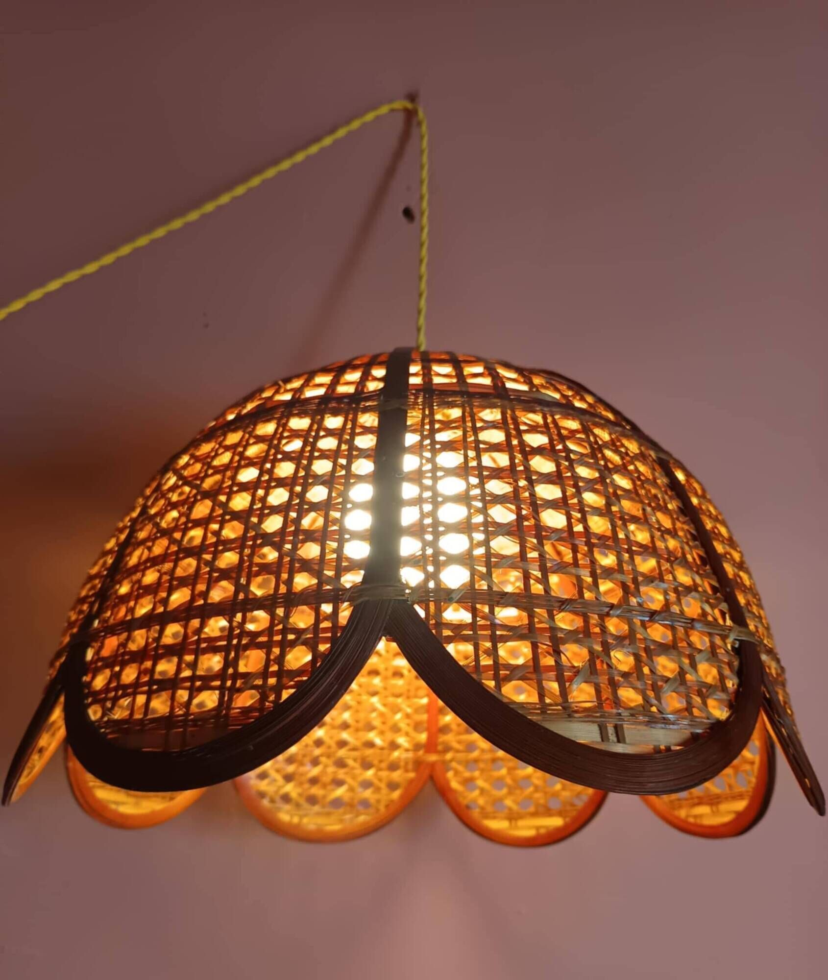 Large cane and rattan vintage bohemian suspension from the 1970s.