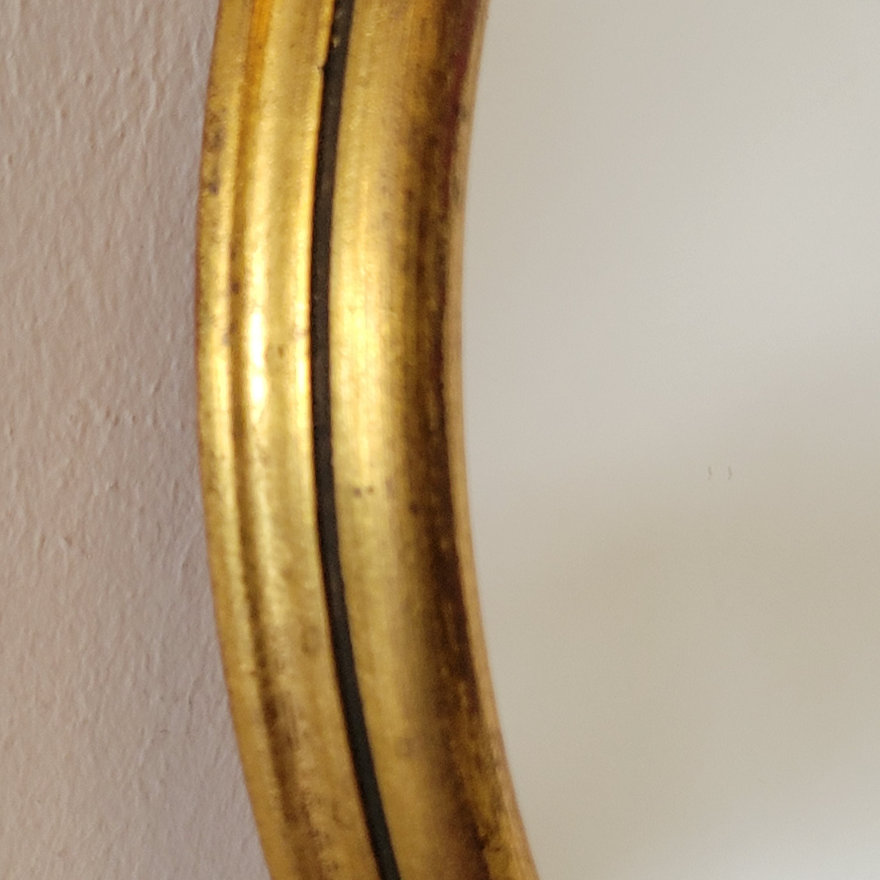 Old small oval mirror gilded wooden frame 22 X 17 X 2 cm.
