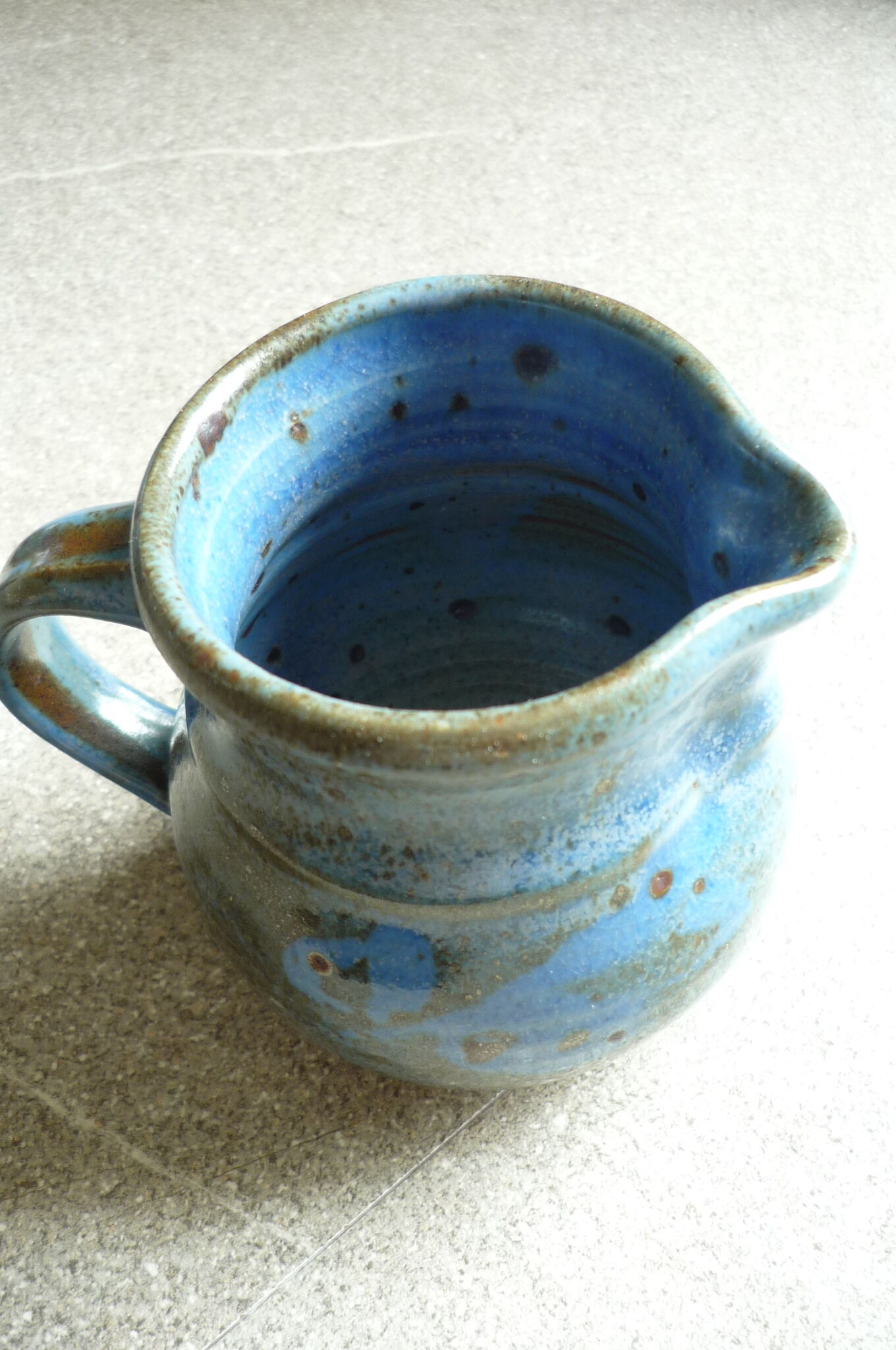 Vernified and flamed sandstone teapot, and its milk pot