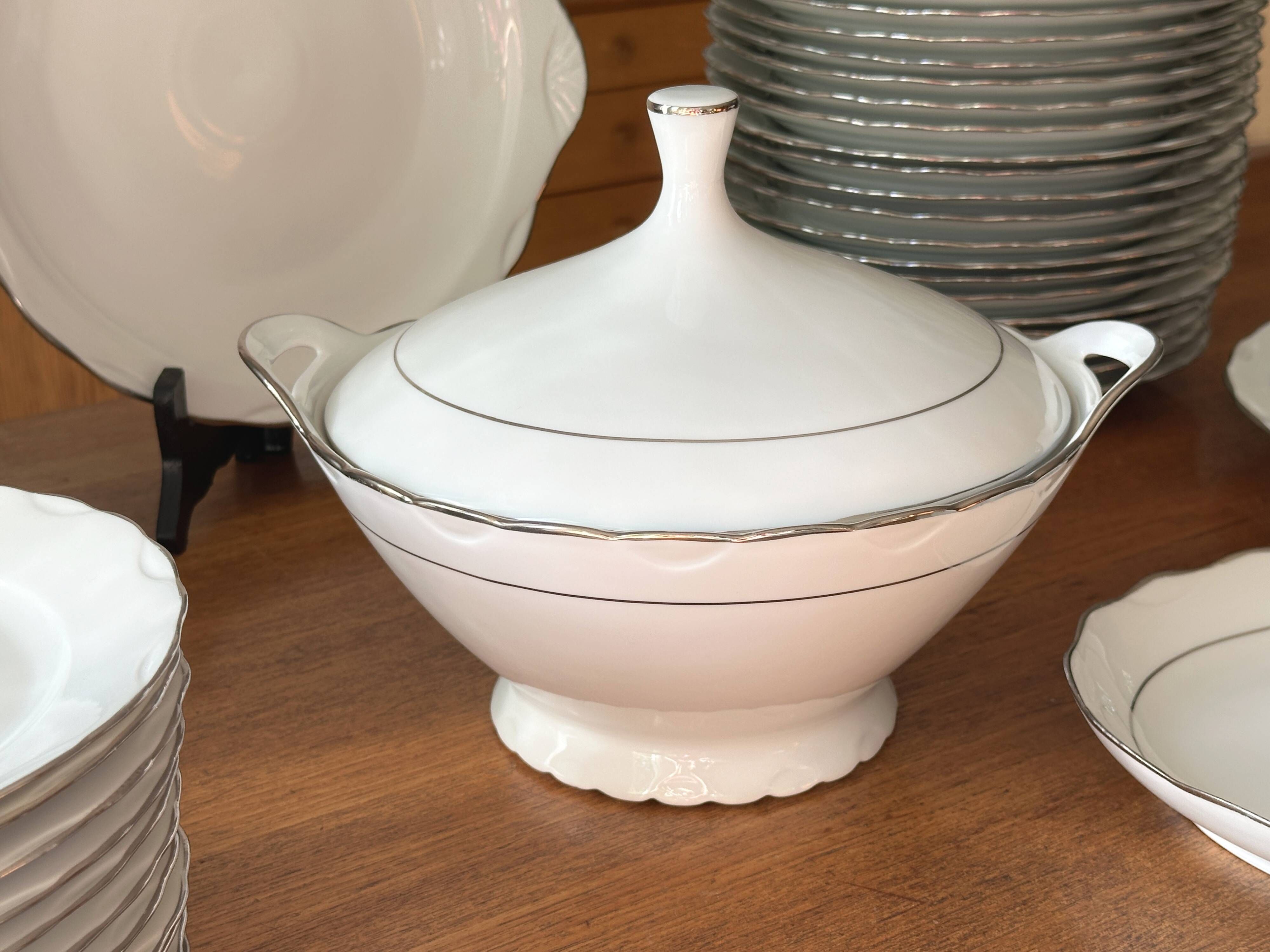 White and silver table service, Limoges porcelain, 56 pieces - in good condition.