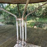 Old cast iron art-deco garden table