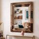 Vintage gold wall mirror with a smoked mirror border.