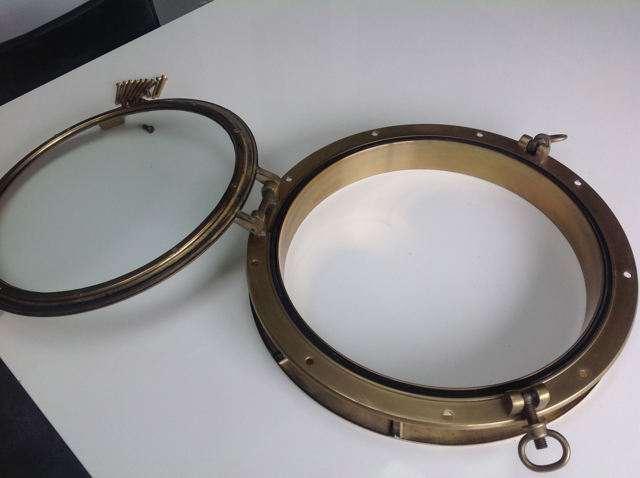 Brass opening partition window