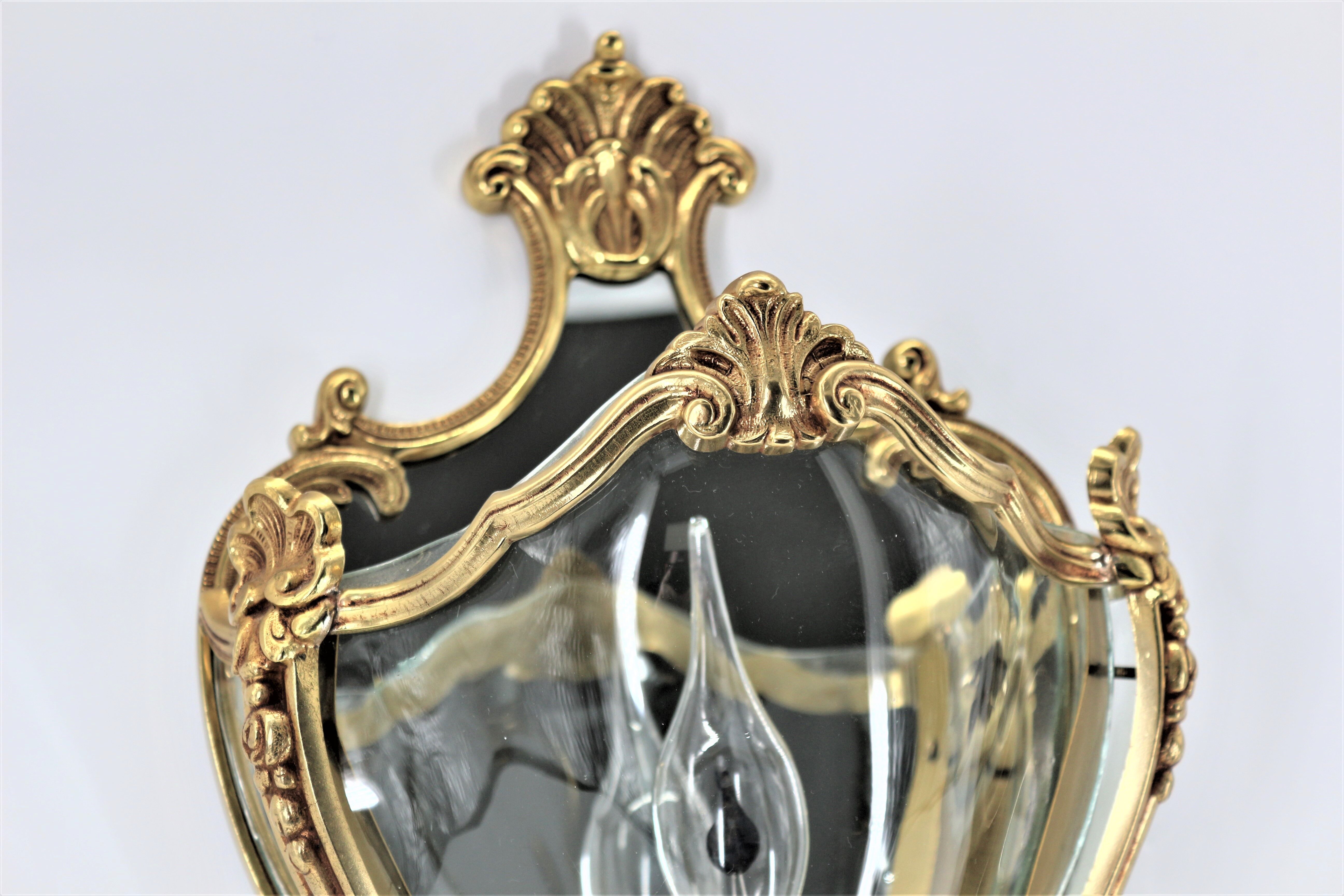 Pair of Louis XV style appliques in solid bronze & curved glass