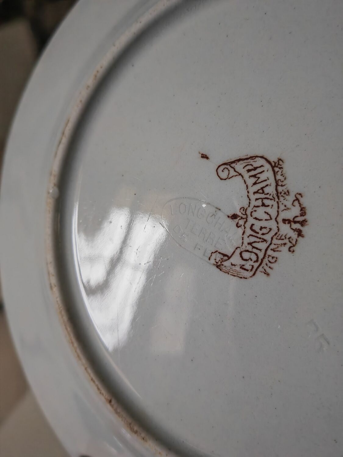 Lonchamp iron earth plate
