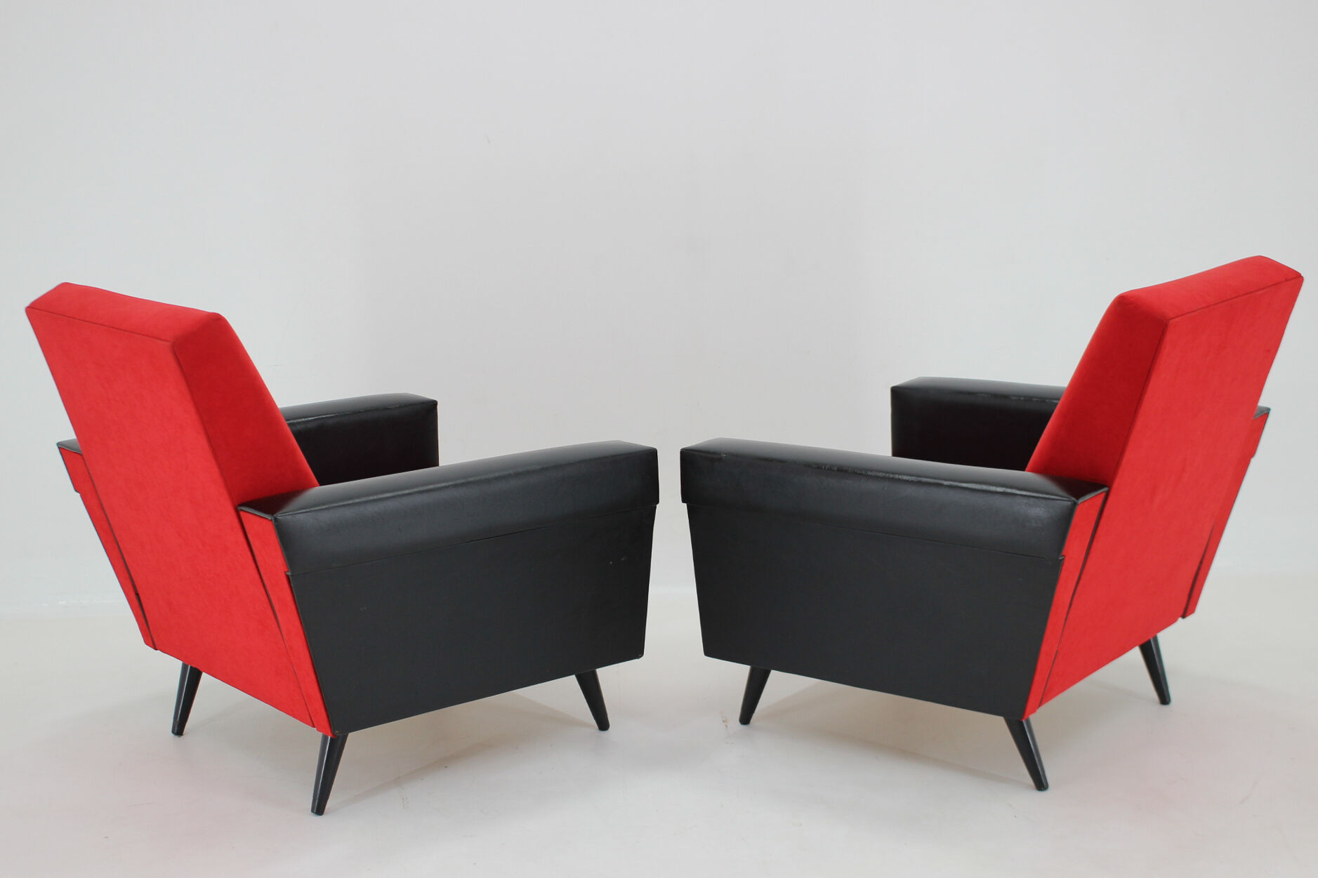 1970's pair of leatherette and red fabric armchairs, Czechoslovakia