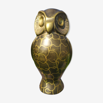 Brass owl printed with acid