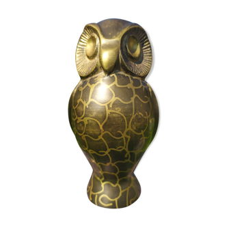 Brass owl printed with acid