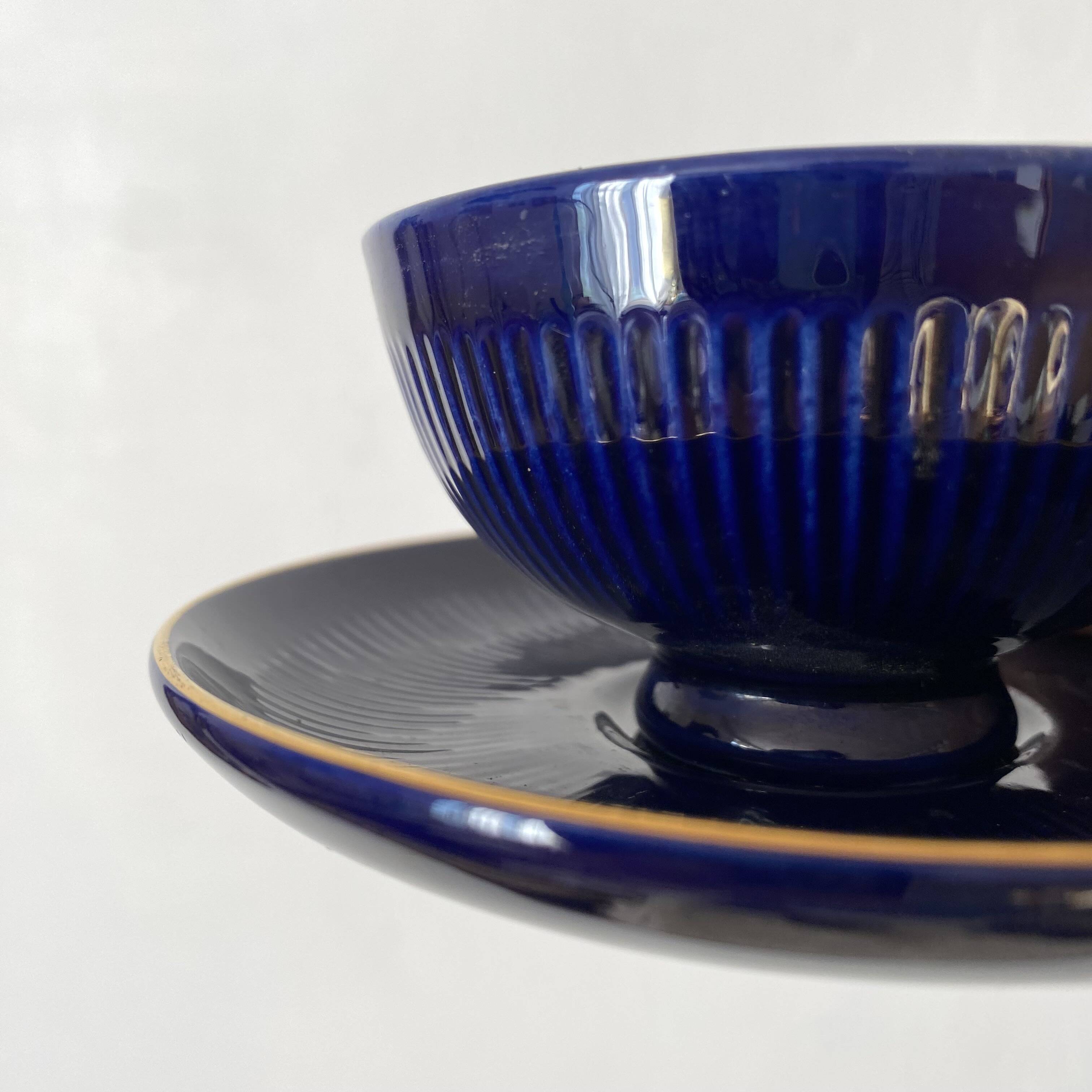 Midnight blue and gold coffee cups and saucers