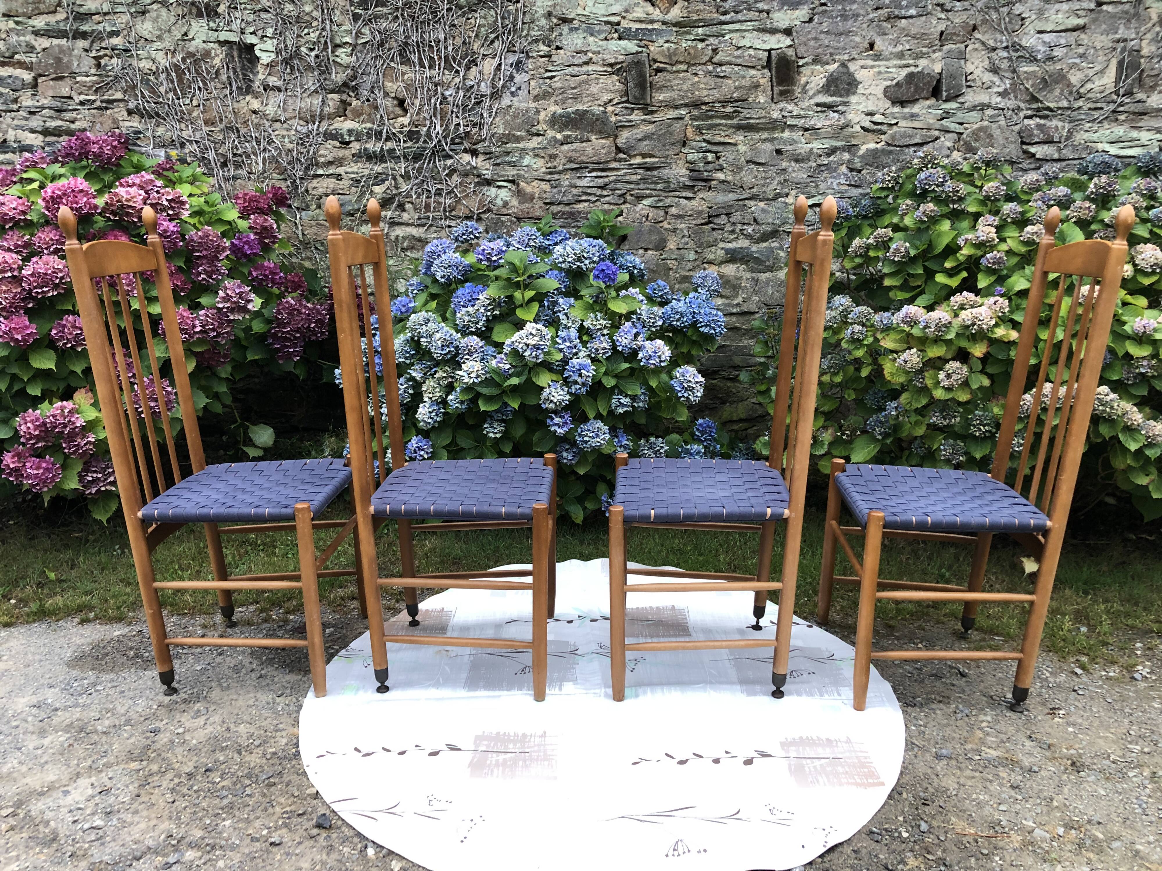 4 vintage Roche Bobois chairs from the 80s in beech with woven seats in blue fabric.
