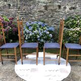 4 vintage Roche Bobois chairs from the 80s in beech with woven seats in blue fabric.