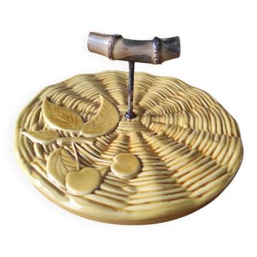 Ceramic cheese board with bamboo handle