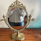 Swivelling brass mirror
