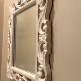 20th century wall mirror with beveled edges and wooden frame