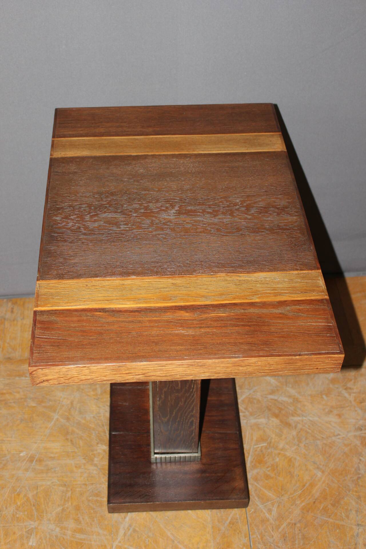 Art Deco period pedestal table in oak and nickel-plated bronze circa 1930