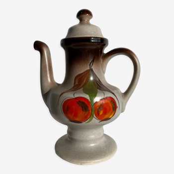 Vintage stoneware teapot with flower and fruit patterns