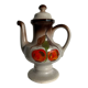Vintage stoneware teapot with flower and fruit patterns