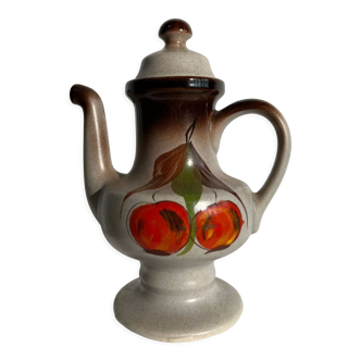 Vintage stoneware teapot with flower and fruit patterns