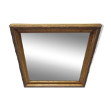 Small old mirror in wood and gilded stucco