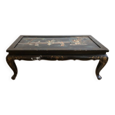 Table basse chinoise en bois laqué noir et décor doré