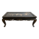 Table basse chinoise en bois laqué noir et décor doré