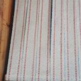 Bench in pine and gingham fabrics