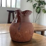 Glazed earthenware jug