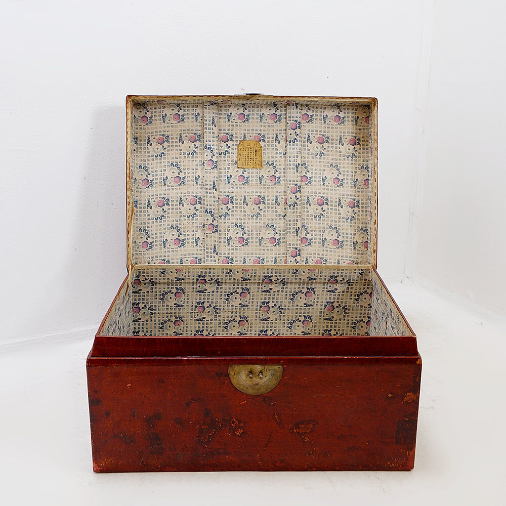 Chinese red lacquered leather trunk from the early 20th century.