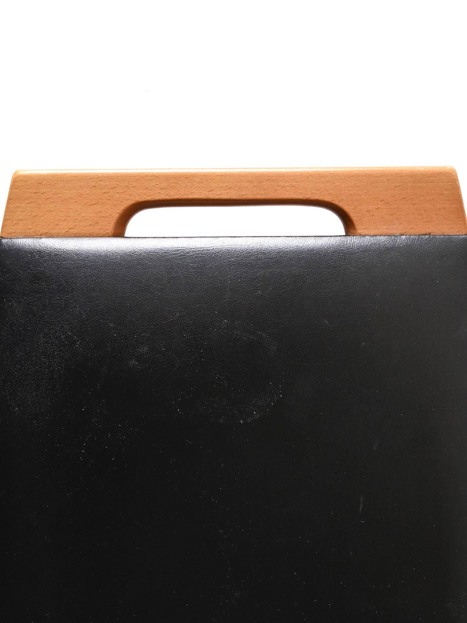 Vintage stool in wood and leather