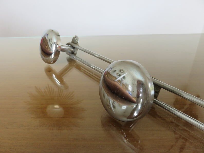 3-70s gold metal coat holder