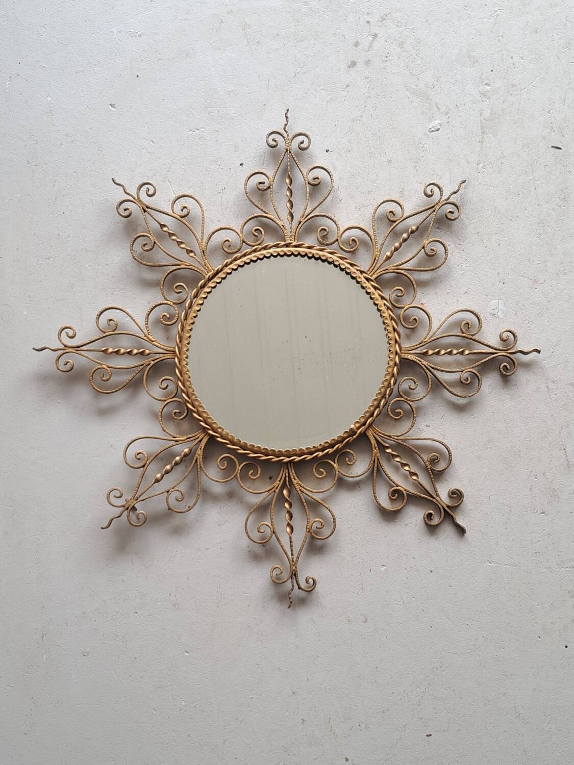 Vintage gold metal sun mirror