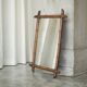 Grand miroir faux bambou en bois massif et miroir patiné, début XXe siècle