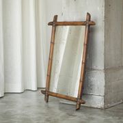 Large faux bamboo mirror in solid wood and patinated mirror, early 20th century.