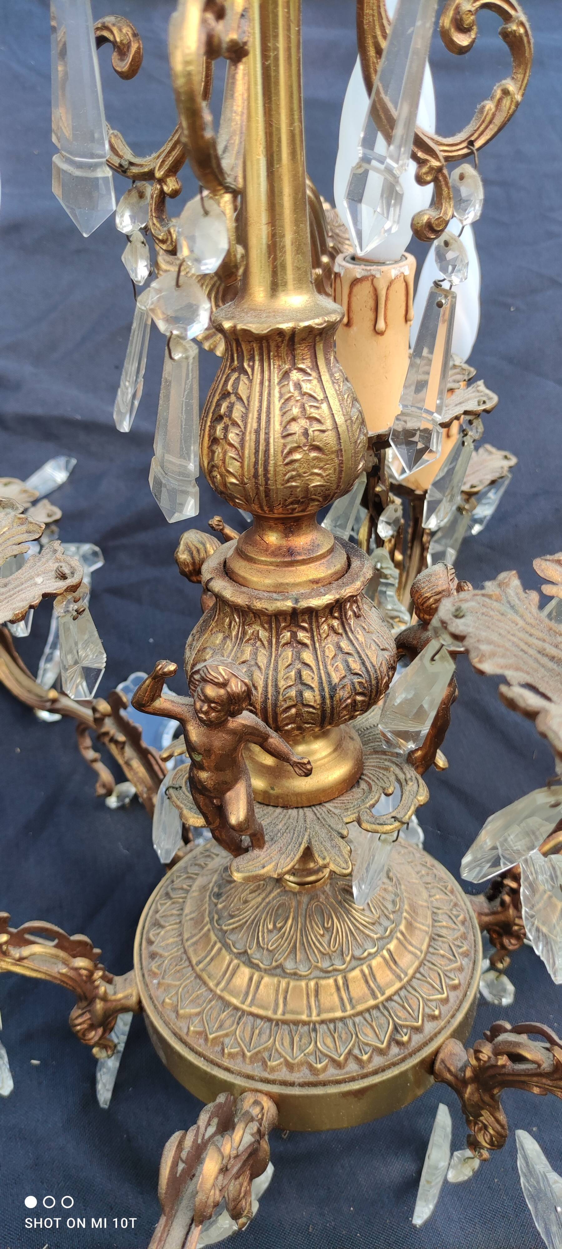 Old bronze chandelier/stamps and angel décor