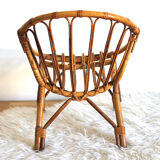 Child chair in rattan shell shape